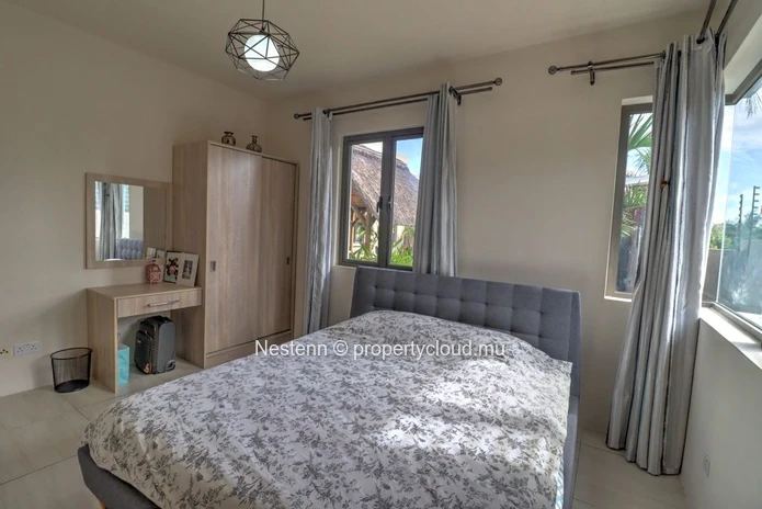 Comfortable 2-bedroom apartment with swimming pool, green spaces and immediate proximity to amenities