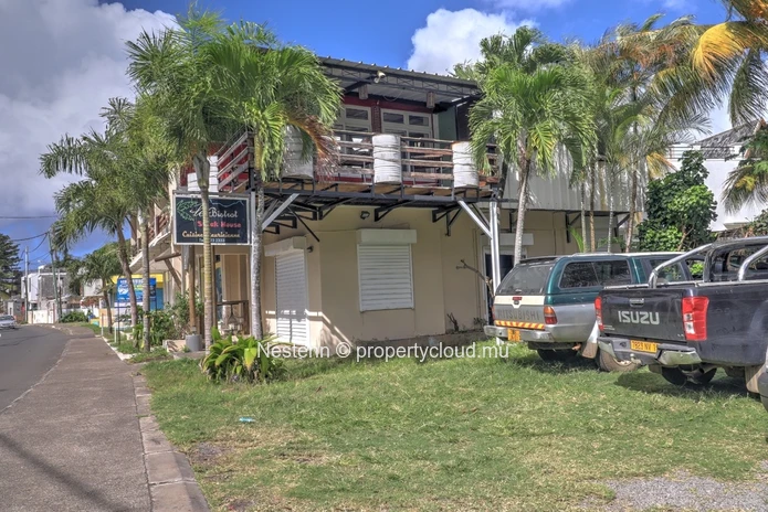 Building comprising of restaurant, guest house and office spaces with sea view