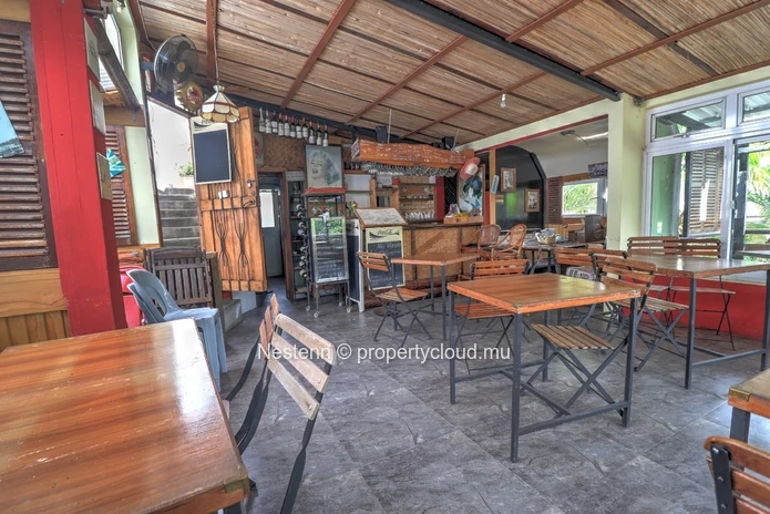 Building comprising of restaurant, guest house and office spaces with sea view
