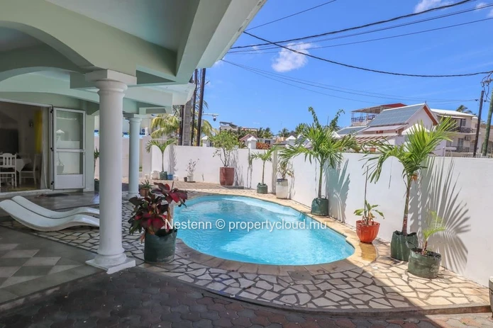 3-Bedroom apartment nust 2 minutes from the beach with modern comforts and swimming pool.