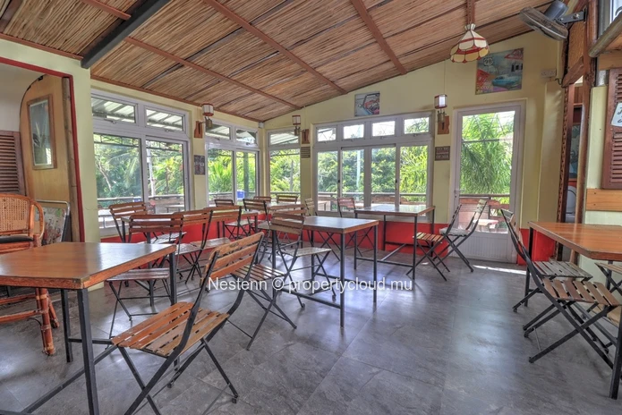 Building comprising of restaurant, guest house and office spaces with sea view