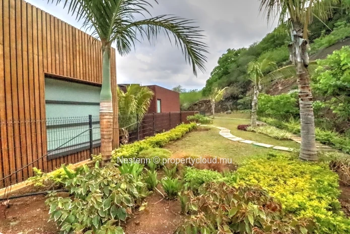 Villa d'exception de 5 chambres en suite avec vue imprenable sur le lagon et la montagne du Morne 