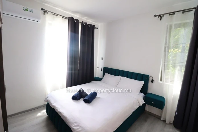 Vie côtière moderne – Appartement élégant et entièrement meublé à 3 minutes de la plage de Flic en Flac