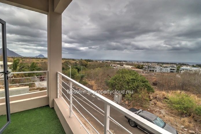 Modern house with swimming pool upstairs and sea and mountain views.
